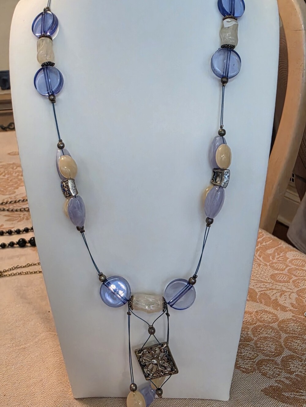 Multi-Strand Silver-tone Crystal Necklace with Ornate Round Pendant